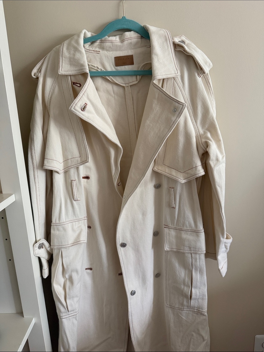 Crescent Cream Trench Coat with Button Front. 100% Cotton.